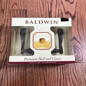 Baldwin Hall/Closet Distressed Oil Rubbed Bronze Passage Door Handle Wave Lever
